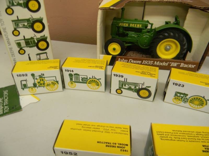 8 john deere miniature toy tractors