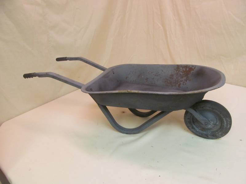 lot 30 image: Miniature vintage wheel barrel...