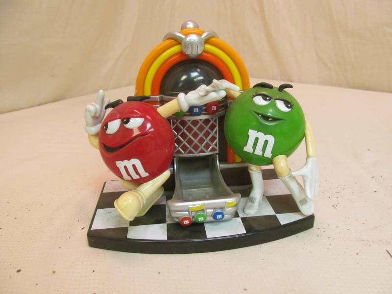 lot 125 image: M&M candy dispenser...