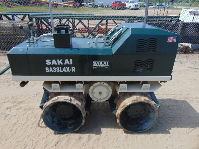 lot 1 image: 2016 Sakai America Vibratory Trench Roller With Remote and Transmitter