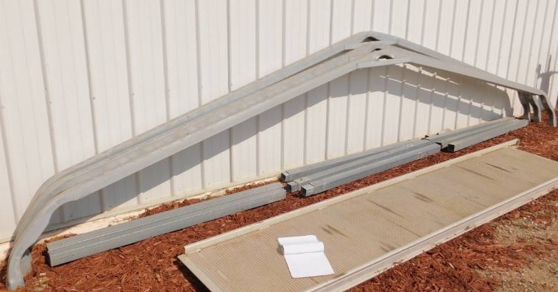 lot 44 image: Poles for GarageStorage Shelter