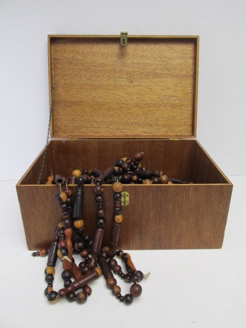lot 44 image: Wooden Box FULL of Vintage Wooden Beaded Strands