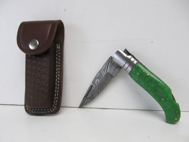 lot 153 image: Nice Hand Made Damascus Steel Blade Folding Knife