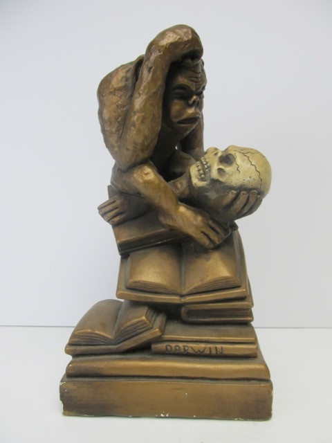 lot 247 image: Vintage Monkey Holding Skull Staue by Marwal Industries