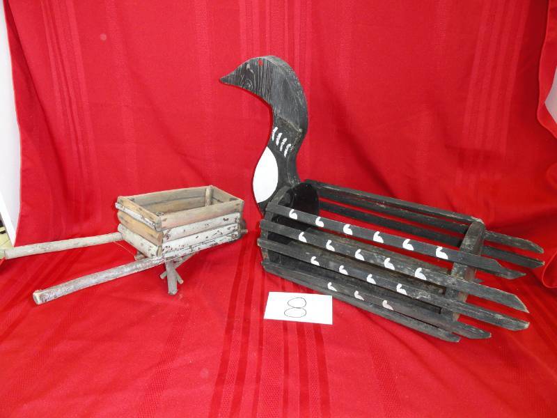 lot 8 image: Loon and Wheel Barrow Planters