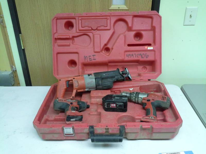 lot 2013 image: Milwaukee 18V Cordless Drill, Impact Driver, Sawzall, Battery, Case, Manuals