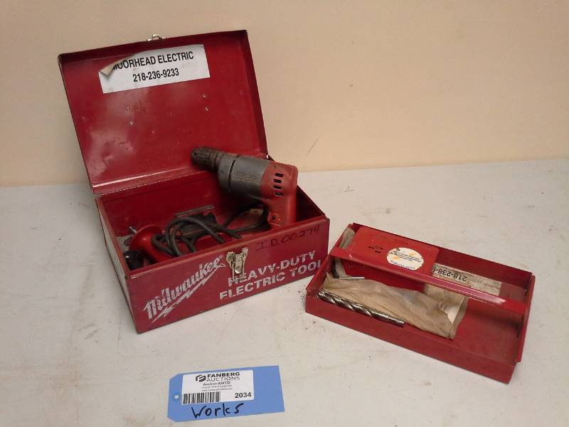 lot 2034 image: Milwaukee Corded Drill, Metal Tool Case with Caddy, Drill Bits