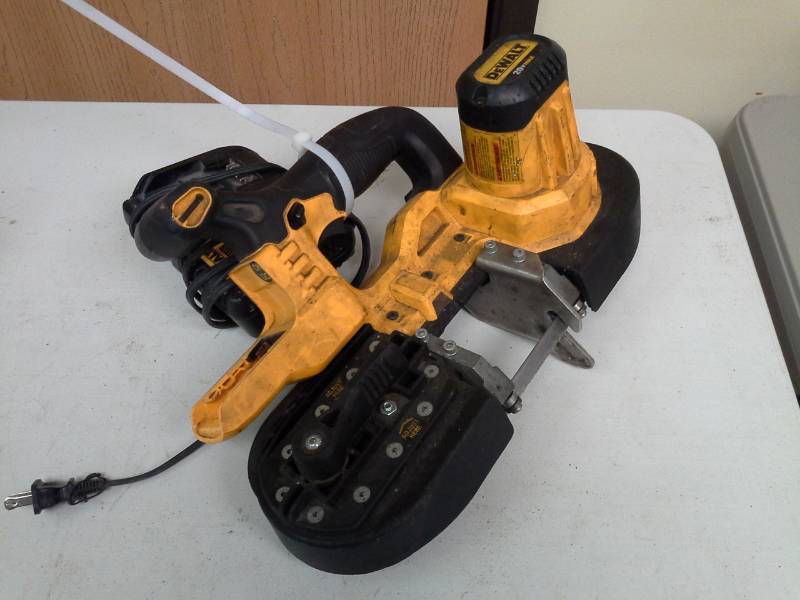 lot 2097 image: DeWalt DCS371 20V Band Saw, DCB115 Charger