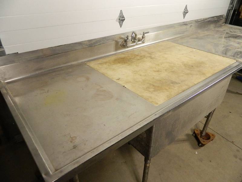 lot 5 image: Large Stainless Sink with Cutting Board Cover