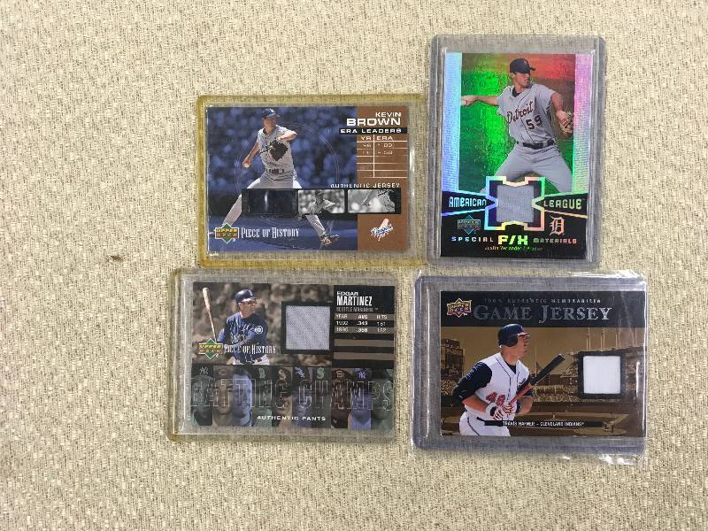 lot 487 image: 4 MLB Game Used Jersey Cards