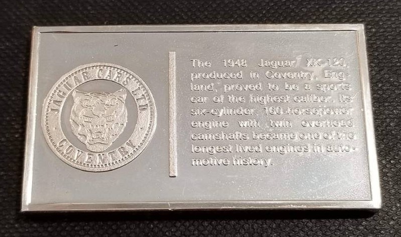 lot 11 image: VINTAGE 1948 JAGUAR 1000 GRAINS (2.08 TROY OZ) STERLING SILVER ART BAR