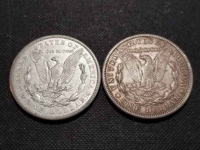 lot 18 image: 2 MORGAN SILVER DOLLARS AS PICTURED