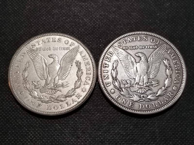 lot 23 image: 2 MORGAN SILVER DOLLARS AS PICTURED
