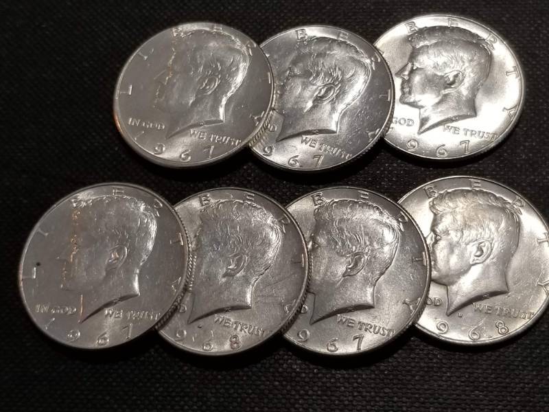 lot 28 image: GROUP OF 7 KENNEDY 40% SILVER HALF DOLLARS AU-UNC
