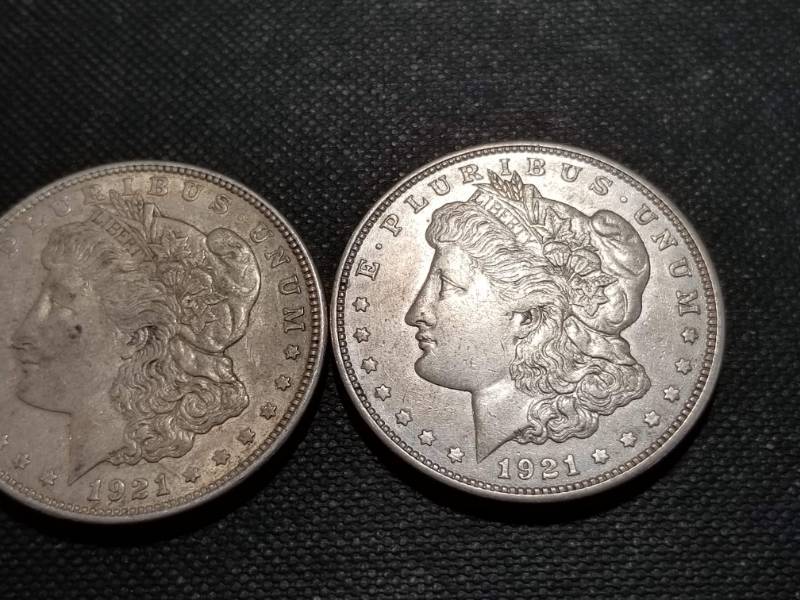 lot 32 image: 2 MORGAN SILVER DOLLARS AS PICTURED