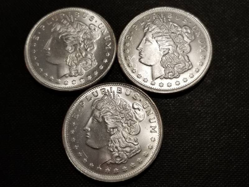 lot 44 image: 3 TROY OZ .999 FINE SILVER (3X 1oz MORGAN DOLLAR DESIGN ROUNDS)