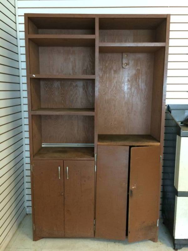 lot 9 image: Tall Wooden Bookcase with Doors