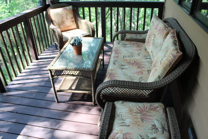 lot 49 image: Patio Set - Glass-Top Coffee Table, 2-Chairs, Sofa, Foot Rest, Seat and Back Pads