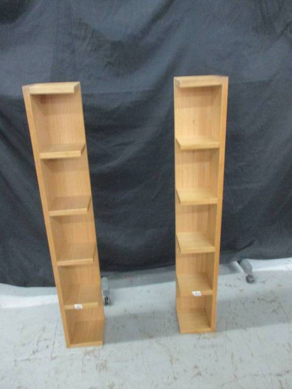 2 Shelves that Hang on the wall with deviders about 47x 7x7