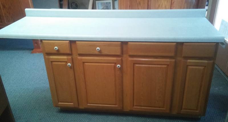 lot 4 image: 60 in. Sink Base and 2 base drawer cabinets