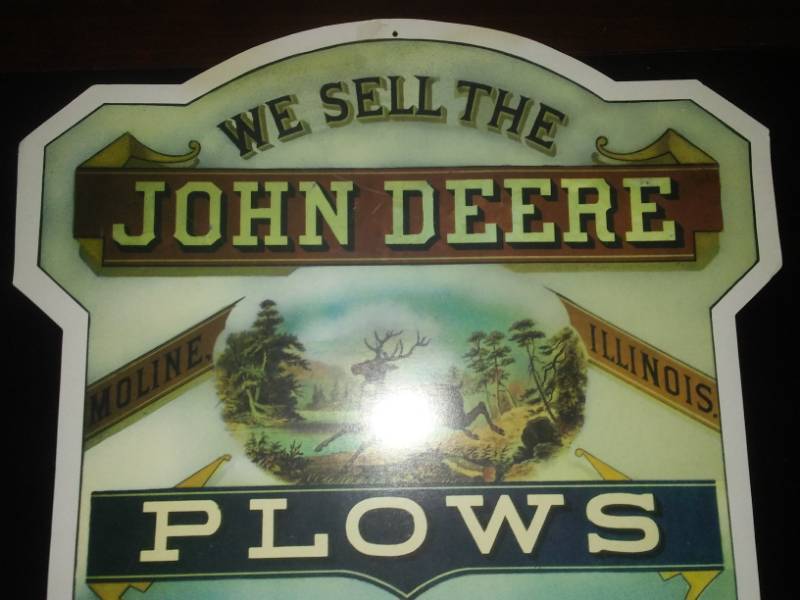 lot 43 image: John Deere plow sign.