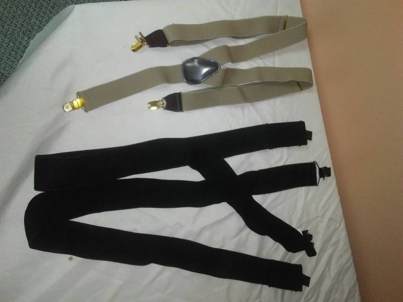 lot 96 image: Two brand-new suspenders black and khaki.