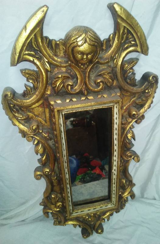 lot 150 image: Ornate Angel mirror
