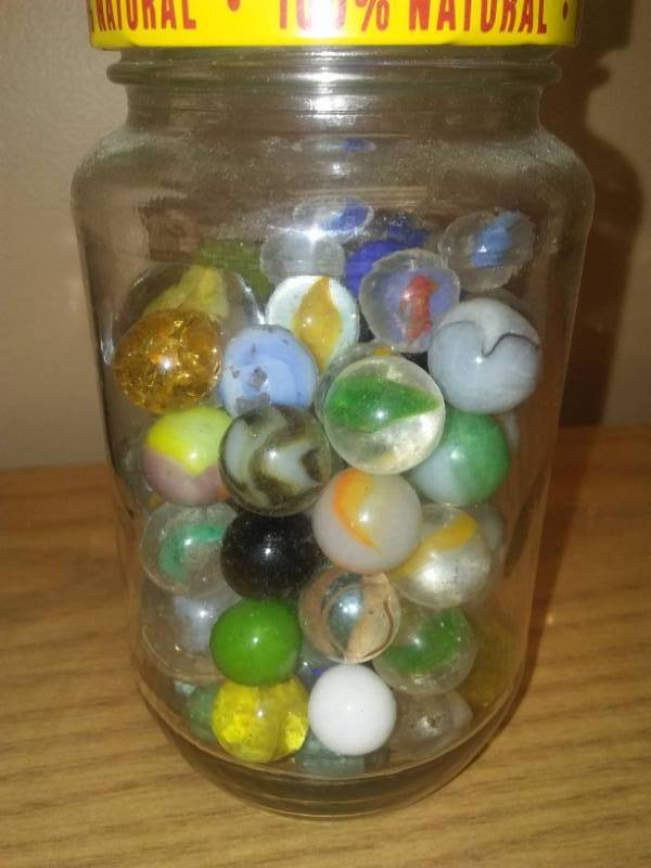lot 151 image: Jar of marbles, circa 1956 - see pictures.
