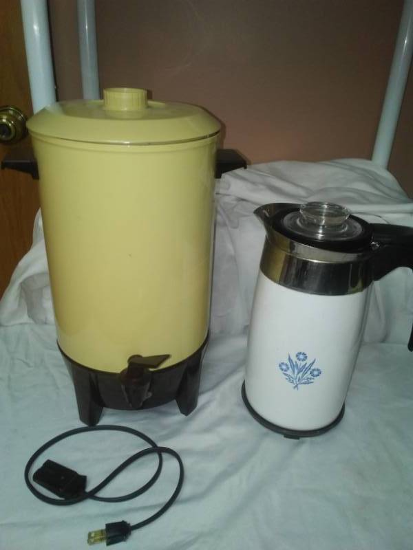 lot 176 image: West Bend 30 cup and Corning Ware  coffee makers.
