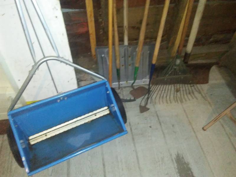 lot 228 image: Rakes, shovels, hose, fertilizer seeder spreader.