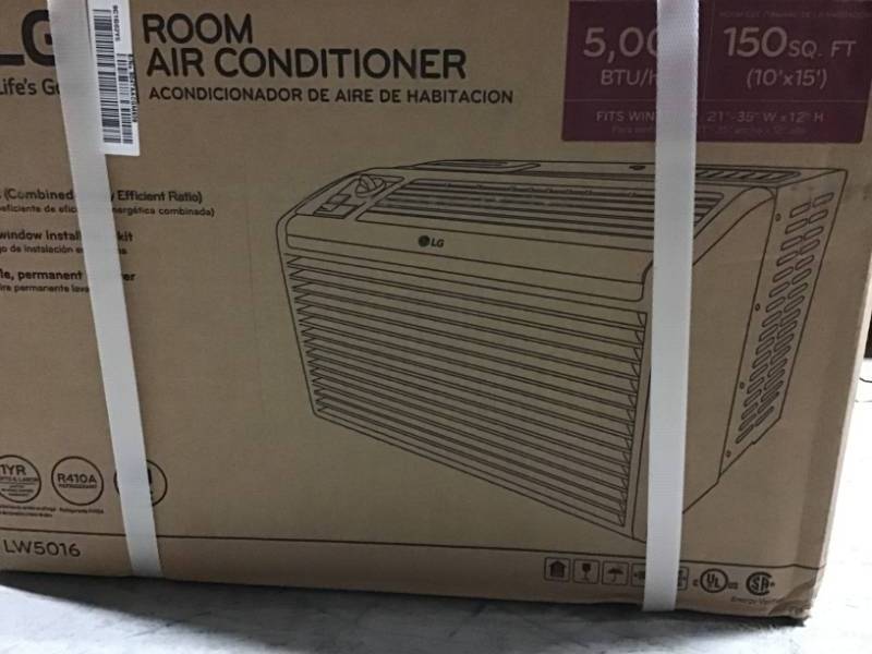 LG Electronics 5,000 BTU 115-Volt Window Air Conditioner in White not used