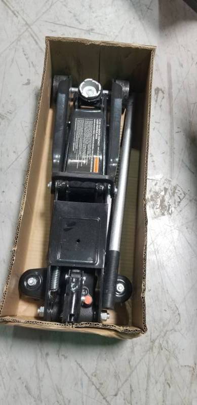 lot 15 image: Husky 2-12-Ton 5,000 lb. Low Profile Jack in good condition