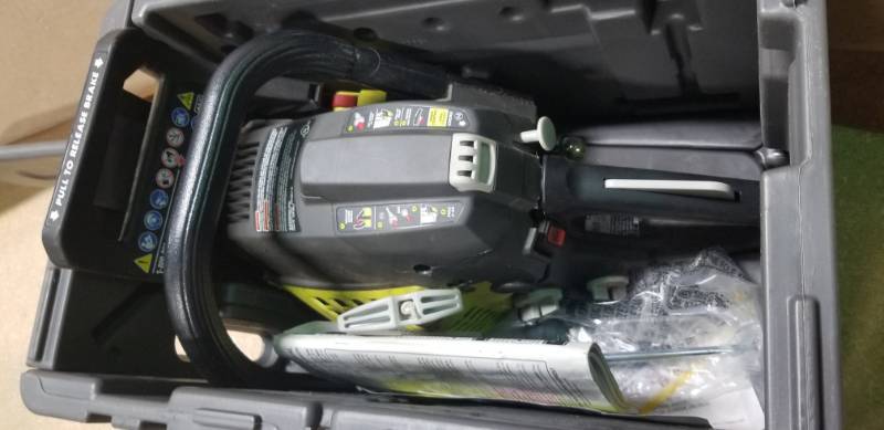lot 19 image: RYOBI 16 in. 37cc 2-Cycle Gas Chainsaw with Heavy-Duty Case USED in good condition