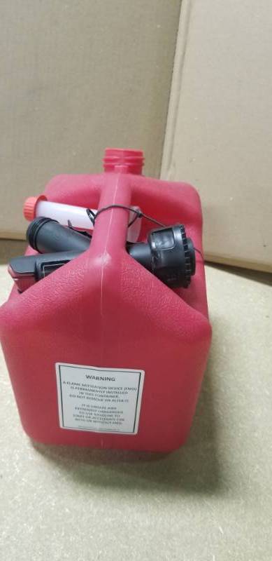 lot 22 image: Garage Boss Press N Pour 2 Gal. Gas Can in good condition