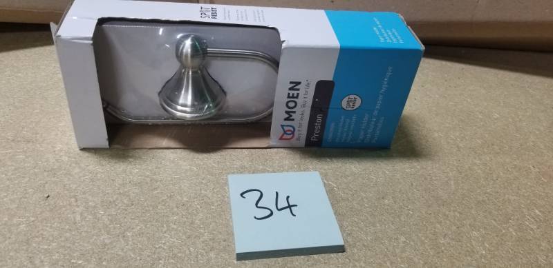 lot 34 image: MOEN Preston Single Post Toilet Paper Holder in Spot Resist Brushed Nickel in good condition