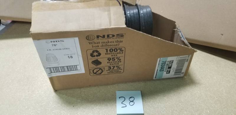 lot 38 image: NDS 4 in. Round Atrium Grate- Black in good condition