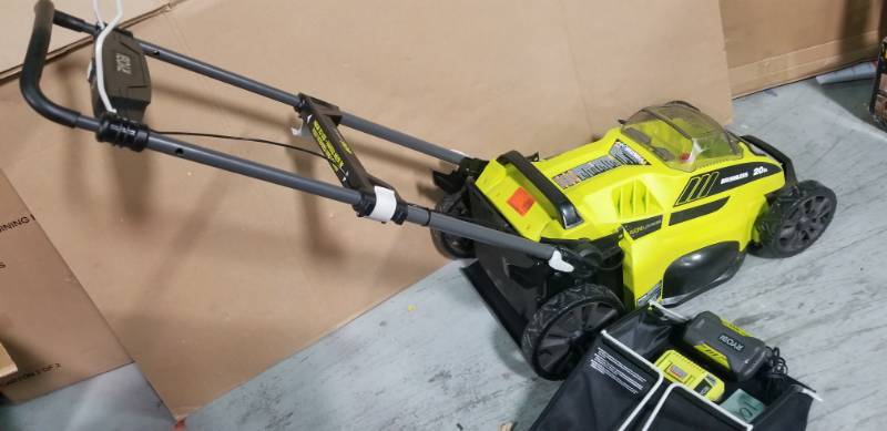 lot 101 image: RYOBI 20 in. 40-Volt Brushless Lithium-Ion Cordless Battery Walk Behind Push Lawn Mower 5.0 Ah BatteryCharger Included in good condition