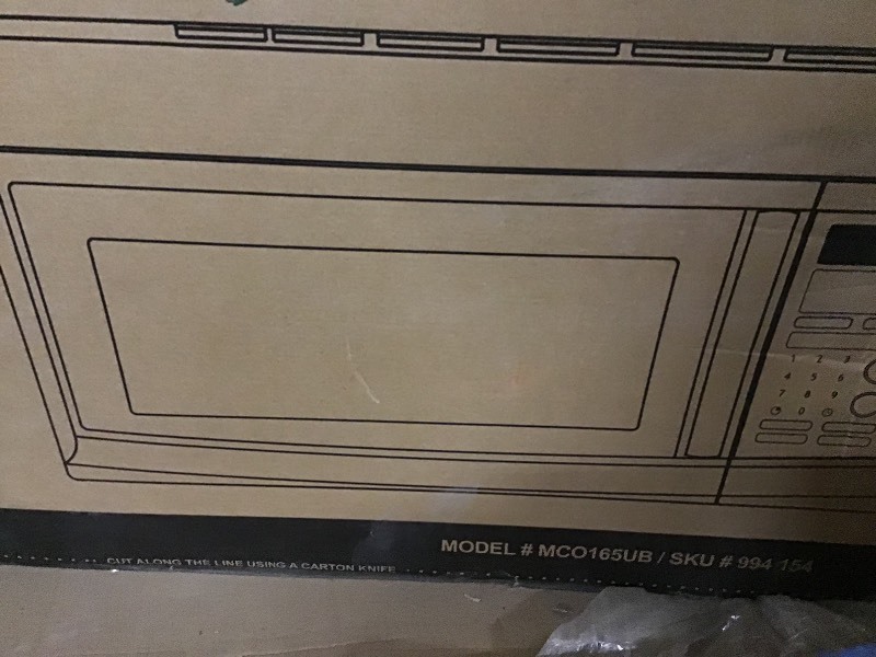 lot 112 image: Magic Chef 1.6 cu. ft. Over the Range Microwave in Black in good conditions