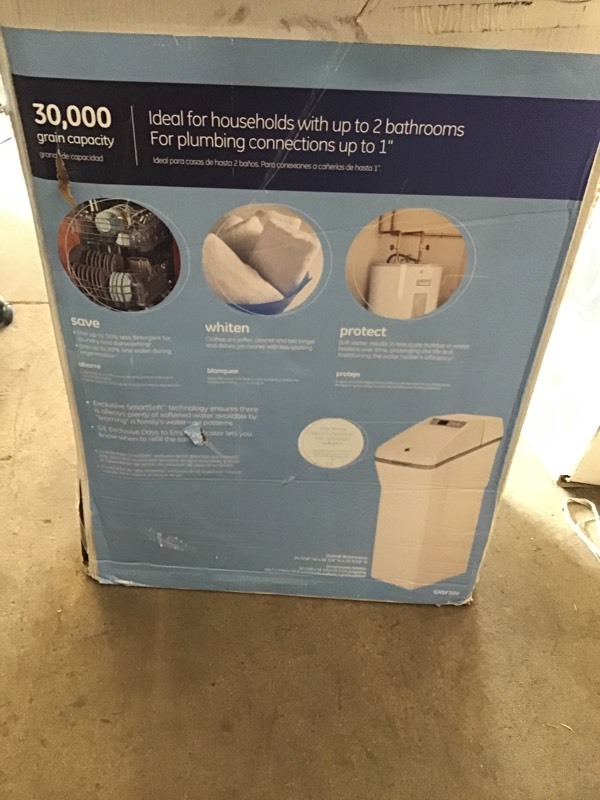 lot 120 image: GE 30,000 Grain Water Softener in good conditions back side cover are damage please review the photos