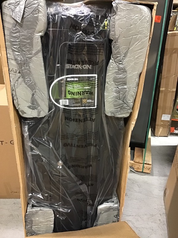 lot 103 image: Stack-On 10-Gun 6 cu. ft. Key Lock Security Cabinet in good conditions