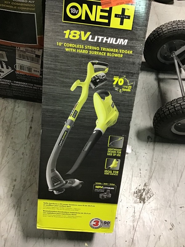 lot 110 image: RYOBI ONE 18-Volt Cordless String TrimmerEdger and BlowerSweeper Combo Kit (2-Tool) - 2.6 Ah Battery and Charger Included not used