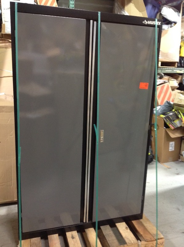 lot 123 image: Husky 72 in. H x 46 in. W x 24 in. D Welded Steel Floor Cabinet in BlackGray no used whit small dent please review the pictures
