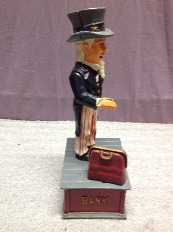 lot 13 image: Uncle Sam Cast Iron Mechanical Bank