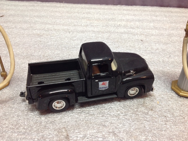 lot 18 image: Mobil Gas Pickup & 2 Visible Gas Pumps