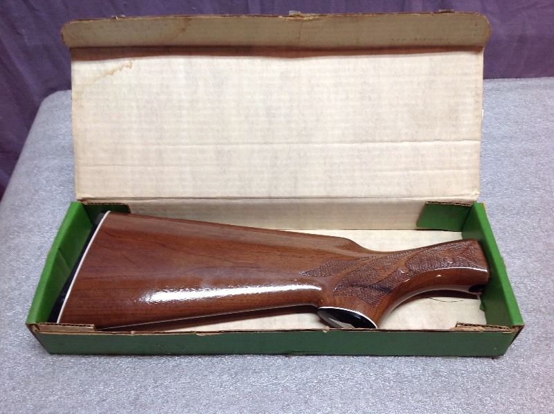 lot 45 image: NOS 1100 12 Gauge Stock