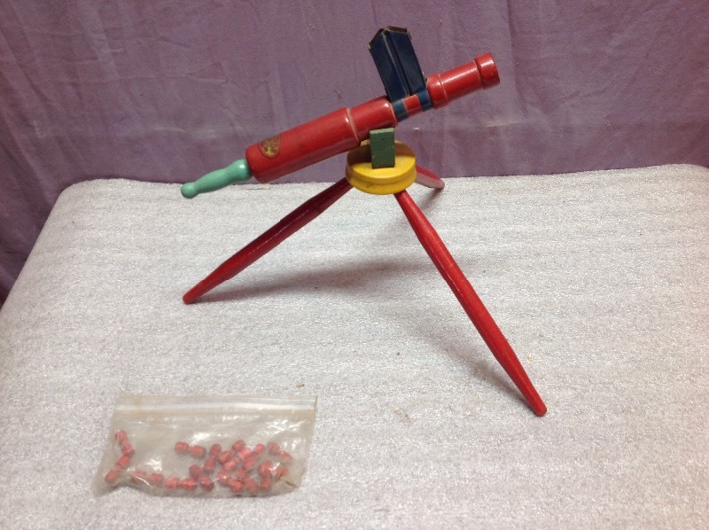 lot 4 image: 1931 Rapid Fire Machine Gun Toy