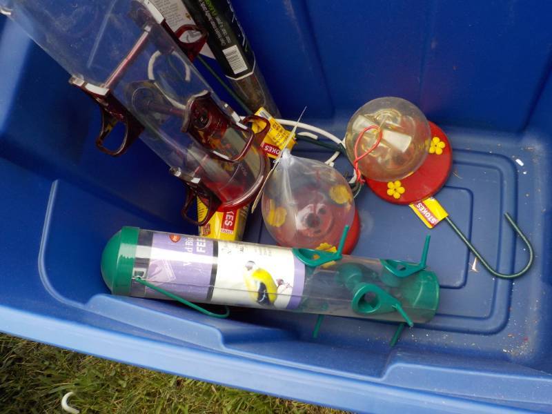 Covered Tote full of Bird Feeders...