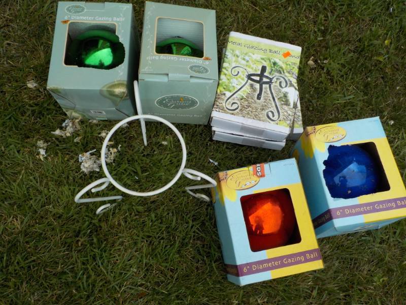 4 Stands with Gazing Globes...