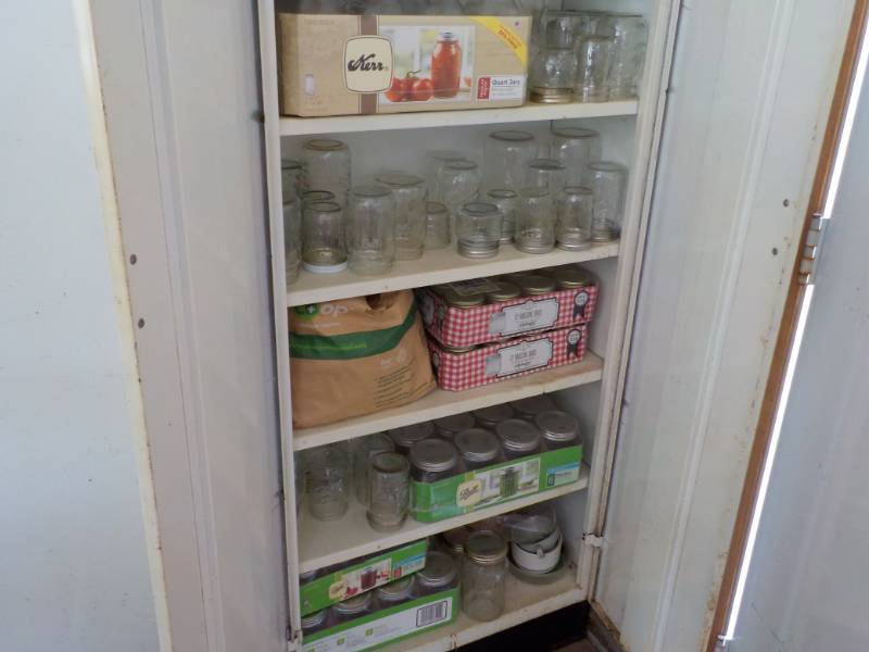 Canning Jars in Metal Cabinet,all p...