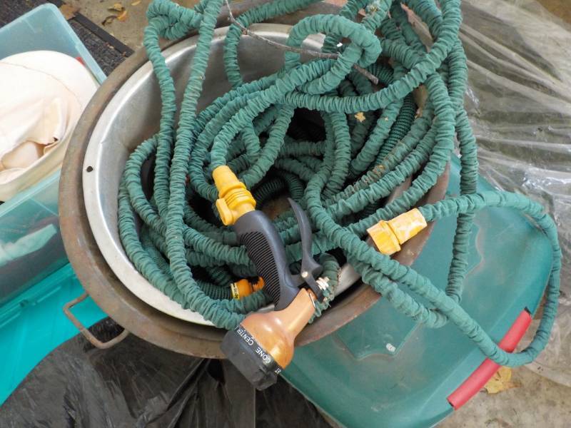 Hose and 2 Metal Pans...